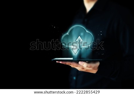 Cloud computing and technology network connection concept, Businessman hand holding icon cloud server transfer data device