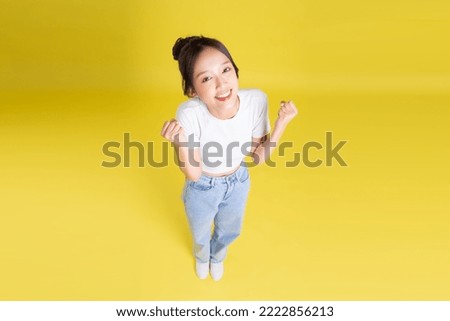 full body image of beautiful asian girl top view Royalty-Free Stock Photo #2222856213