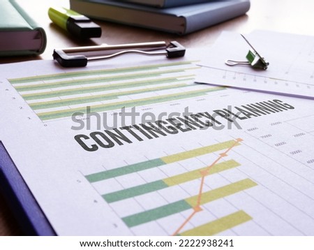 Contingency planning is shown using a text and picture of charts and graphs Royalty-Free Stock Photo #2222938241