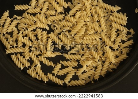 Closeup of Pasta with black background.