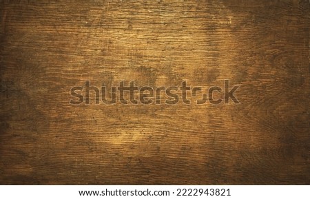 Dark brown background made of old wood. A high-resolution photo of the texture of a vintage countertop.The texture of a very old board.