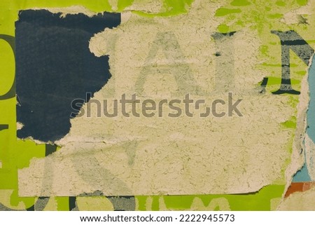 Old ripped torn grunge posters and backgrounds creased crumpled paper backdrop surface placard  Royalty-Free Stock Photo #2222945573