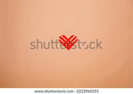 A set of red linear hearts on light beige background. Giving Tuesday, the global day of charity. give help, donations support concept.  Royalty-Free Stock Photo #2222960255