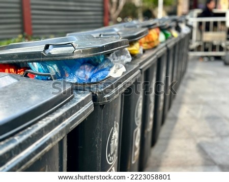 Clean and in order rubbish (Garbage) In An busy street In Shanghai. Royalty-Free Stock Photo #2223058801