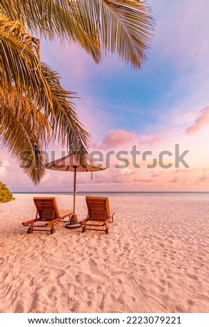 Amazing beach. Chairs on the sandy beach sea. Luxury summer holiday and vacation resort hotel for tourism. Inspirational tropical landscape. Tranquil scenery, relax beach, beautiful landscape design Royalty-Free Stock Photo #2223079221