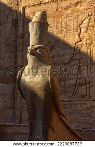 Ancient egyptian statue of falcon god Horus at the Temple of Edfu. Egypt Royalty-Free Stock Photo #2223087739