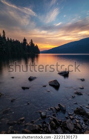 Cultus Lake Shoreline at Sunset in British Columbia, Canada Royalty-Free Stock Photo #2223130173
