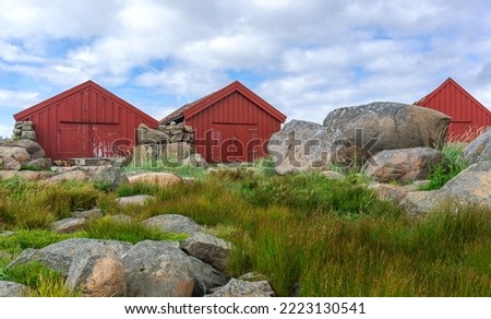 Old fisherman’s sheds at the beach of Brusand, south of Stavanger, Norway