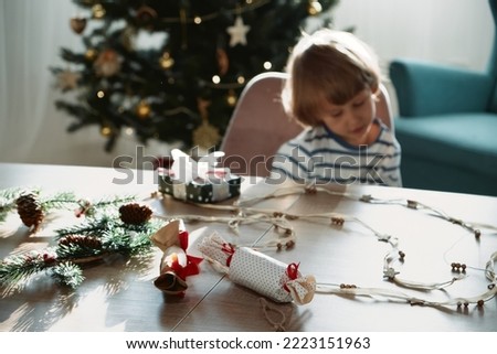 Child unhappy with his gift on Christmas morning
