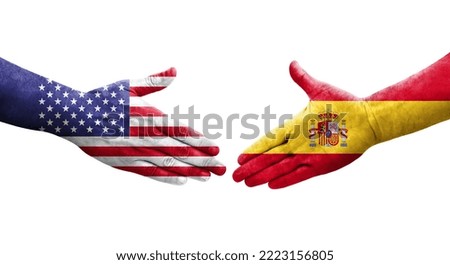 Handshake between Spain and USA flags painted on hands, isolated transparent image.