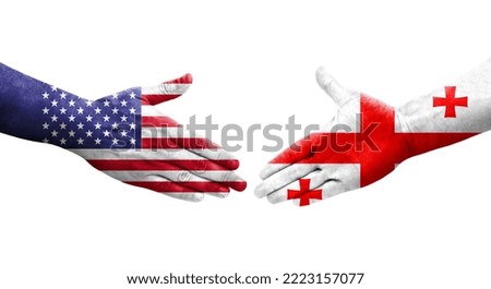 Handshake between Georgia and USA flags painted on hands, isolated transparent image.