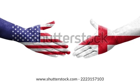 Handshake between England and USA flags painted on hands, isolated transparent image.