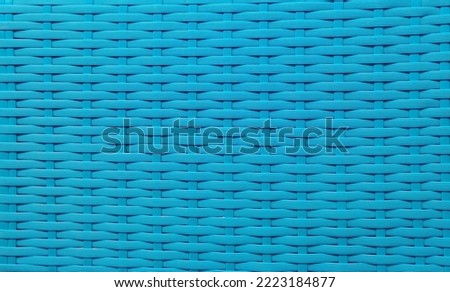 blue plastic woven looks neat and nice to look at Royalty-Free Stock Photo #2223184877