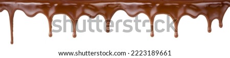 Melt dark or milk chocolate on cake top isolated on white