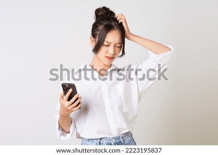 beautiful young asian businesswoman portrait on white background Royalty-Free Stock Photo #2223195837