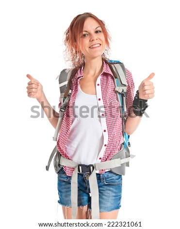 backpacker with thumb up over white background