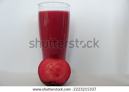 Purple guava juice on a white background