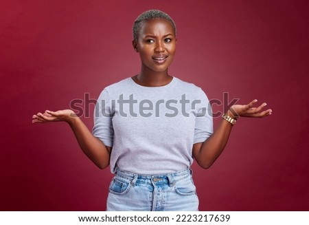 Confused, question and why black woman on studio red background, body language and facial gesture for risk decision, shrug and reaction. Uncertainty, unsure and frustrated model, doubt and confusion Royalty-Free Stock Photo #2223217639