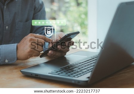 Two factor authentication concept. cyber security with biometrics authentication technology. Virtual safety shield icon while access on phone with laptop for validate password, Identity verification. Royalty-Free Stock Photo #2223217737