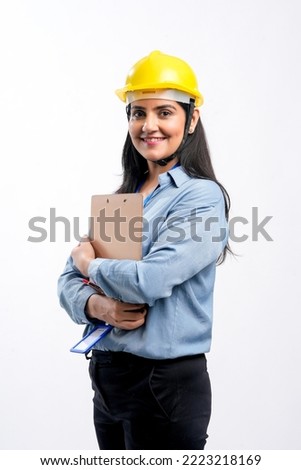 Indian woman engineer giving expression on white background. Royalty-Free Stock Photo #2223218169