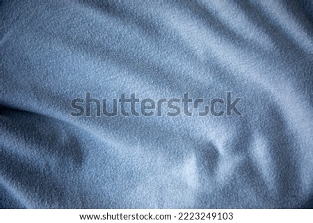 Abstract grey fabric with soft wave texture pleated cotton fabric background
