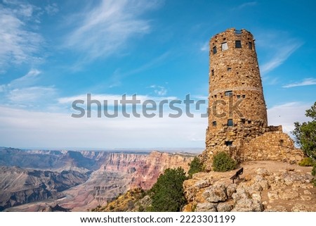 Low Angle View Of Indian Watchtower At Desert View At Grand Canyon National Park and cloudy Blue Sky In Arizona Royalty-Free Stock Photo #2223301199