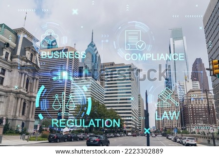 Day time cityscape of Philadelphia financial downtown, Pennsylvania, USA. City Hall neighborhood. Glowing hologram of legal icons. The concept of law, order, regulations and digital justice.