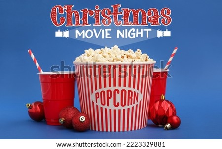 Banner with popcorn, soda drink and Christmas balls on blue background. Christmas celebration