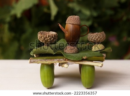 Tea set composition made of natural materials on white wooden table
