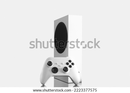 White Next Generation game console and controller. Royalty-Free Stock Photo #2223377575