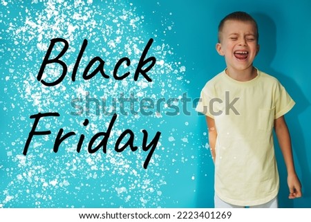 A boy in a yellow T-shirt on a blue background shouts loudly. Black friday shopping concept, front view