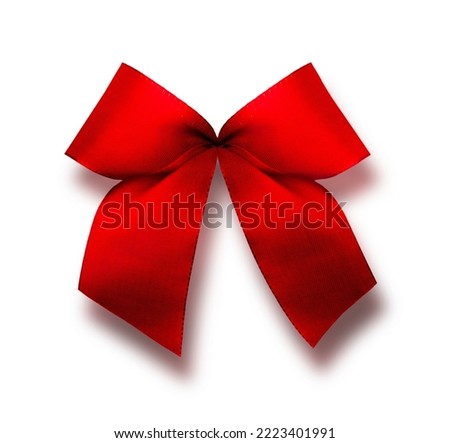 Red christmas ribbon isolated against white background