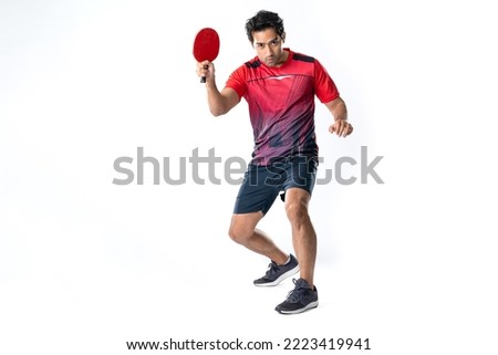 Portrait of sports man male  athlete playing table tennis isolated on white background. Royalty-Free Stock Photo #2223419941