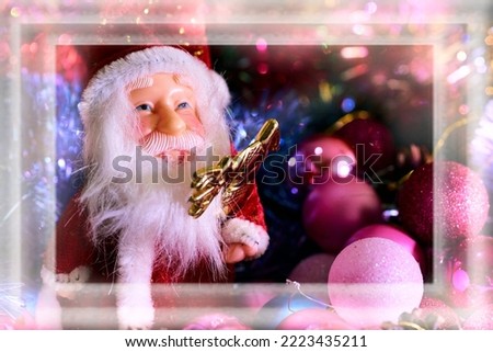  Santa claus, pine cones and christmas toys in a frosty snowy frame                              
