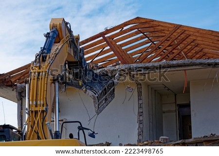 Deconstruction site with tearing down of an apartment building on a sunny autumn day. Photo taken November 7th, 2022, Zurich, Switzerland. Royalty-Free Stock Photo #2223498765