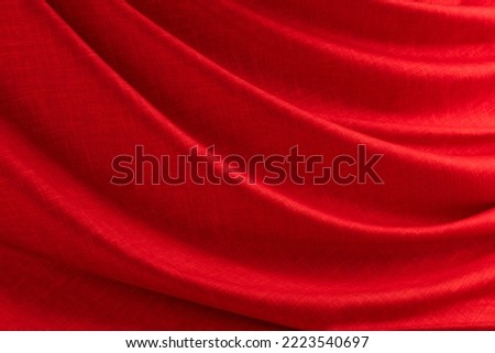 draped red silk fabric of satin weave, texture, background