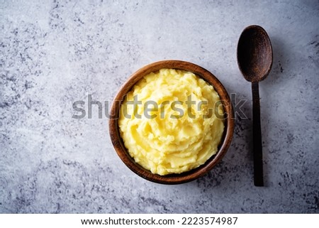 Mushed potato in a bowl. toning Royalty-Free Stock Photo #2223574987