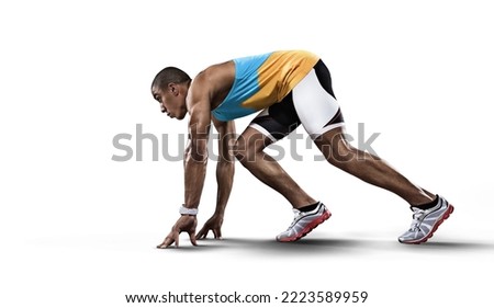 Sport white background. Sprinter leaving starting blocks on the running track. Royalty-Free Stock Photo #2223589959