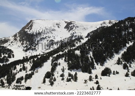 landscape of snow and skiing in the mountains of the Pyrenees in Andorra
