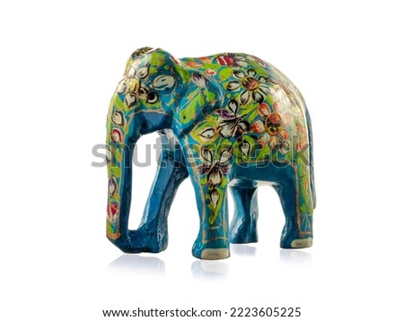 Colourful elephant toy with decoration, indian style on white background