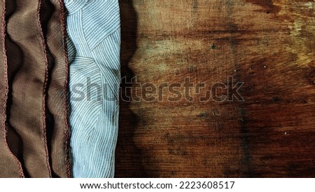 background with brown wood and cloth theme arranged abstractly