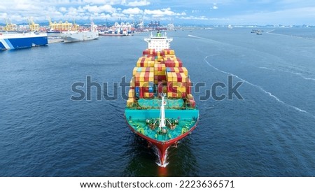 cargo maritime ship with contrail in the ocean ship carrying container and running for export concept technology freight shipping by ship smart service forwarder. front view