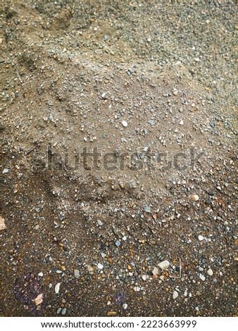 Pile and gravel surface of building sand.