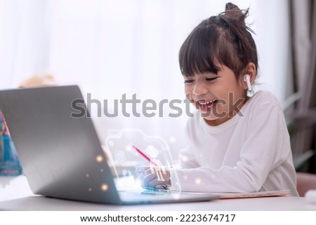 Little Asian girls remotely learn online at home by coding robot cars in STEM, STEAM, mathematics engineering science technology computer code in robotics for kids concept. Royalty-Free Stock Photo #2223674717