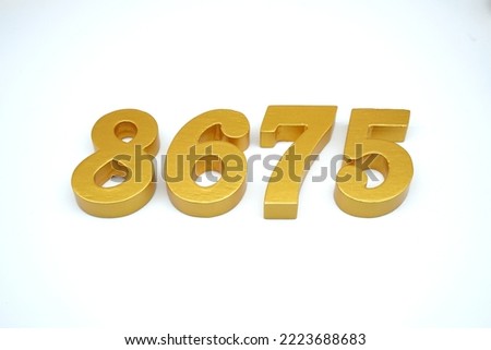   Number 8675 is made of gold-painted teak, 1 centimeter thick, placed on a white background to visualize it in 3D.                                     