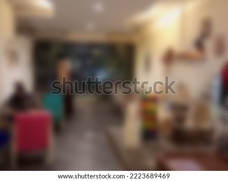 Defocused abstract background of The interior of a coffee shop with a brownish vintage feel