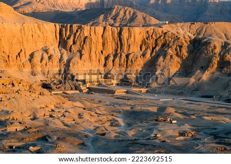 Aerial view of Hatshepsut Temple at sunrise in Valley of the Kings and red cliffs western bank of Nile river- Luxor- Egypt