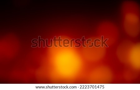 Unfocused abstract background of red lights on a black background. Royalty-Free Stock Photo #2223701475