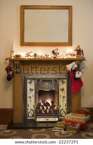 Victorian style fireplace ready for Christmas