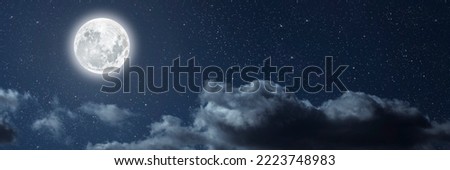 A backgrounds night sky with stars moon and clouds for Christmas
